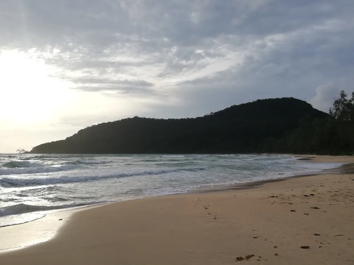 Lazy Beach on Koh Rong Samloem, with pale sand, sea and forested coastline